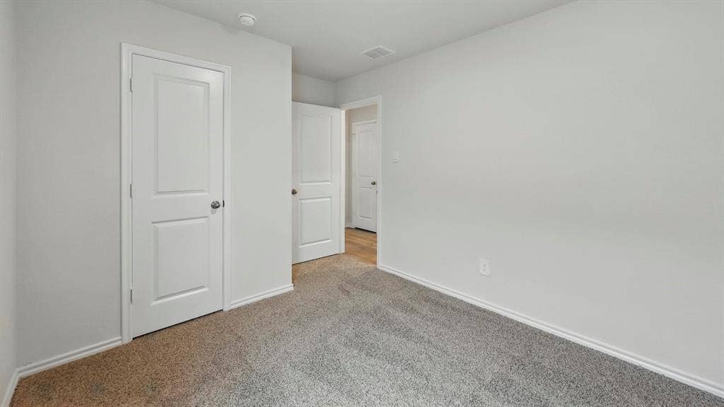 1912 Freeman Street, Tyler, TX 75702 Neutral wall color, carpet flooring, two-panel interior doors, and recessed lighting