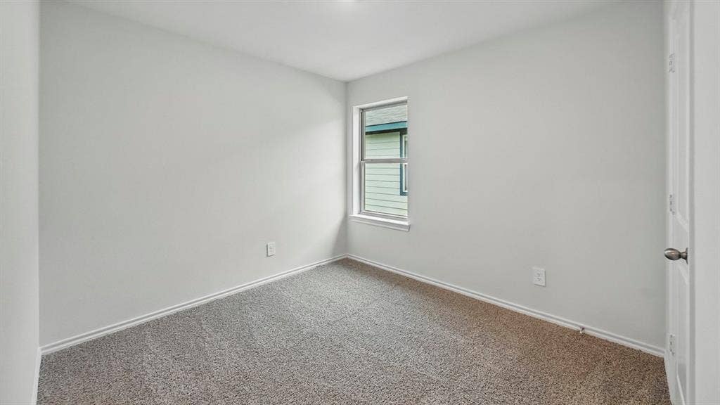 1912 Freeman Street, Tyler, TX 75702 Neutral wall color, carpet flooring, single window, and overhead lighting