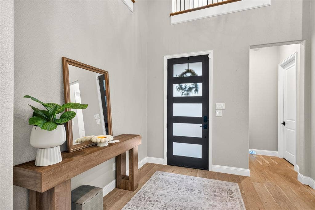 1581 Turnberry Drive, Prosper, TX 75078 Charming covered entry welcomes you into a bright open floor plan