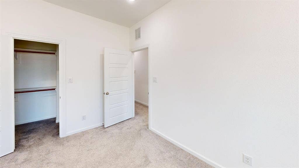 366 Buck Ridge Drive, Frisco, TX 75068 Neutral color palette throughout, featuring light-toned carpeting and white walls