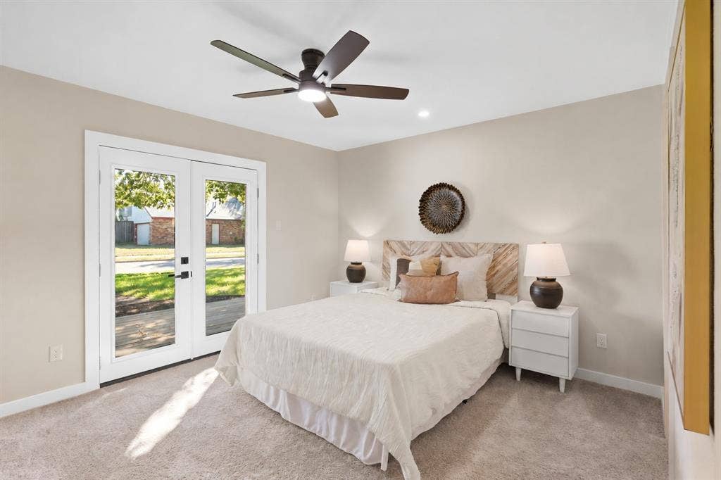 Neutral-toned walls complement plush carpeting