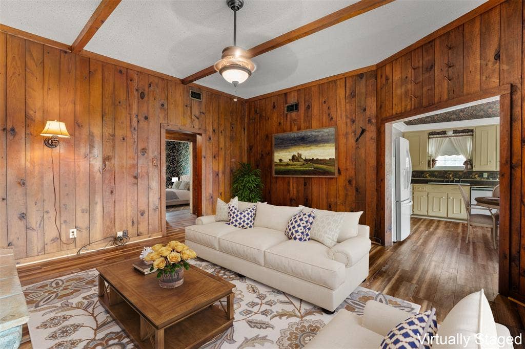 2967 S Old Robinson Road, Robinson, TX 76655 Beautifully wood panel family/den room, open to the kitchen/breakfast area (Virtually staged)