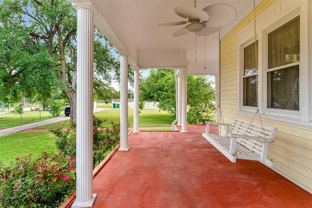2967 S Old Robinson Road, Robinson, TX 76655 Enjoy your morning coffee or just listing to the birds on the porch swing. Wraparound porch with white columns with another entrance into the family room