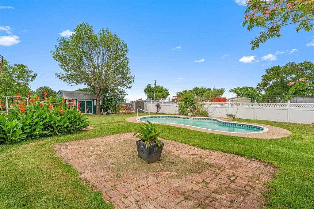 2967 S Old Robinson Road, Robinson, TX 76655 Views of the backyard areas, large brick platform great for patio furniture and grilling
