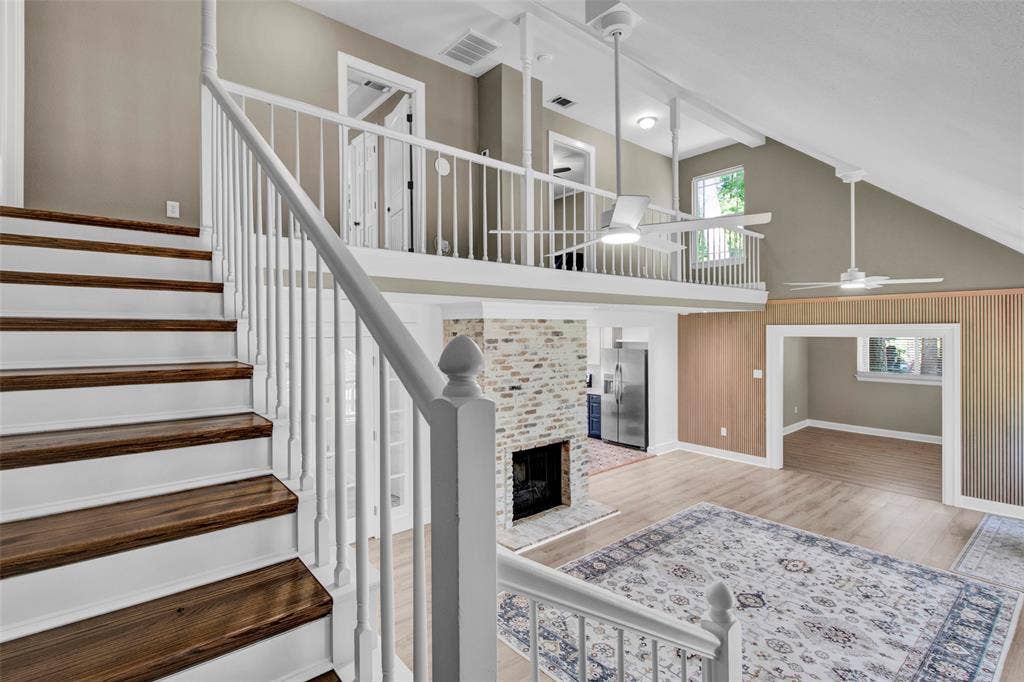 Two-tone staircase with wood-finish treads and white risers