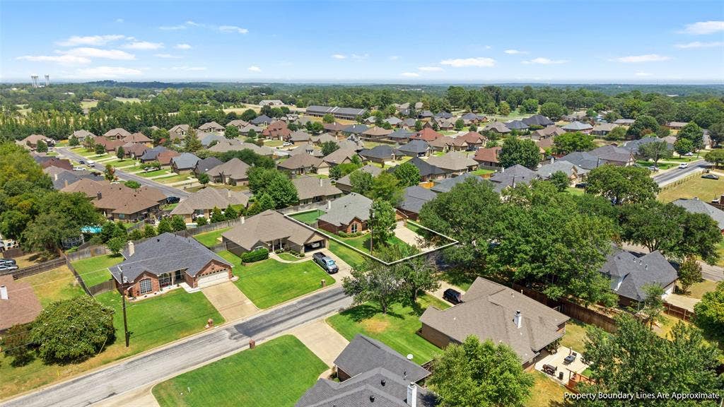 11848 County Road 167, Tyler, TX 75703 Aerial perspective of a residential neighborhood with a variety of home styles