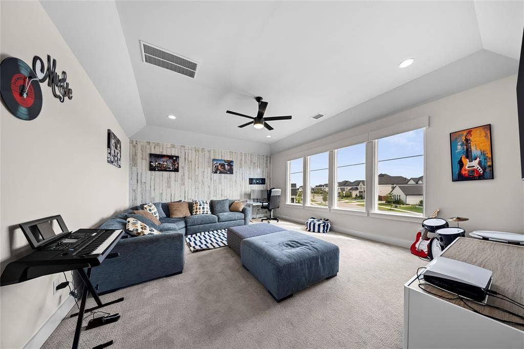 467 Mayfair Lane, Frisco, TX 75033 Recessed lighting, sloped ceiling, ceiling fan, carpet flooring, and a window bank