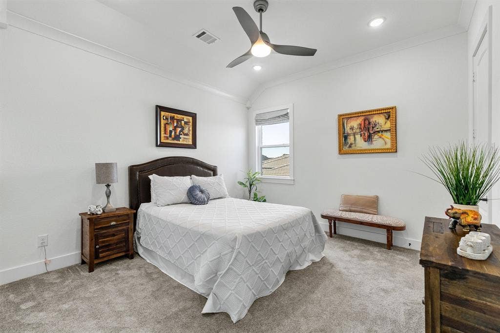 1561 Saint Peter, Prosper, TX 75078 Plush carpeted flooring, a ceiling fan with integrated lighting, and crown molding