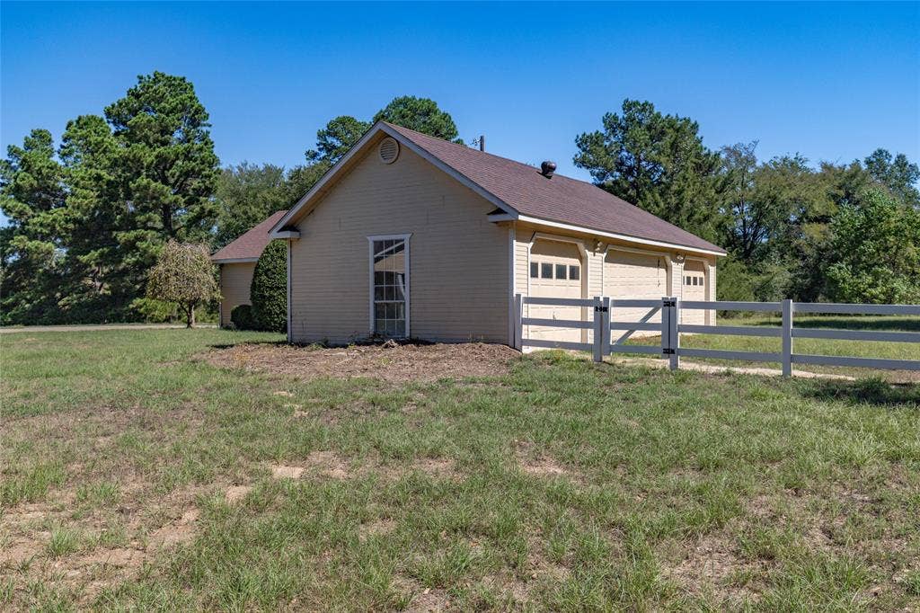 1200 County Road 2307, Sulphur Springs, TX 75482 Backside of workshop can double as barn and is separately fenced for animals.