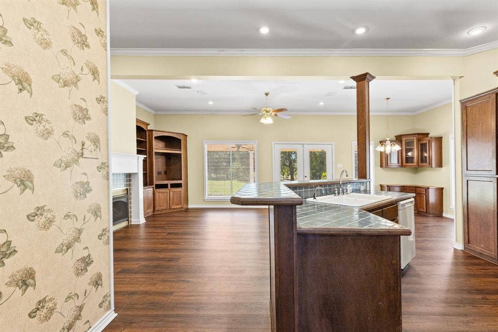 1200 County Road 2307, Sulphur Springs, TX 75482 Another view of island; breakfast room built-ins are visible in the back right corner. Huge pantry just around the corner.
