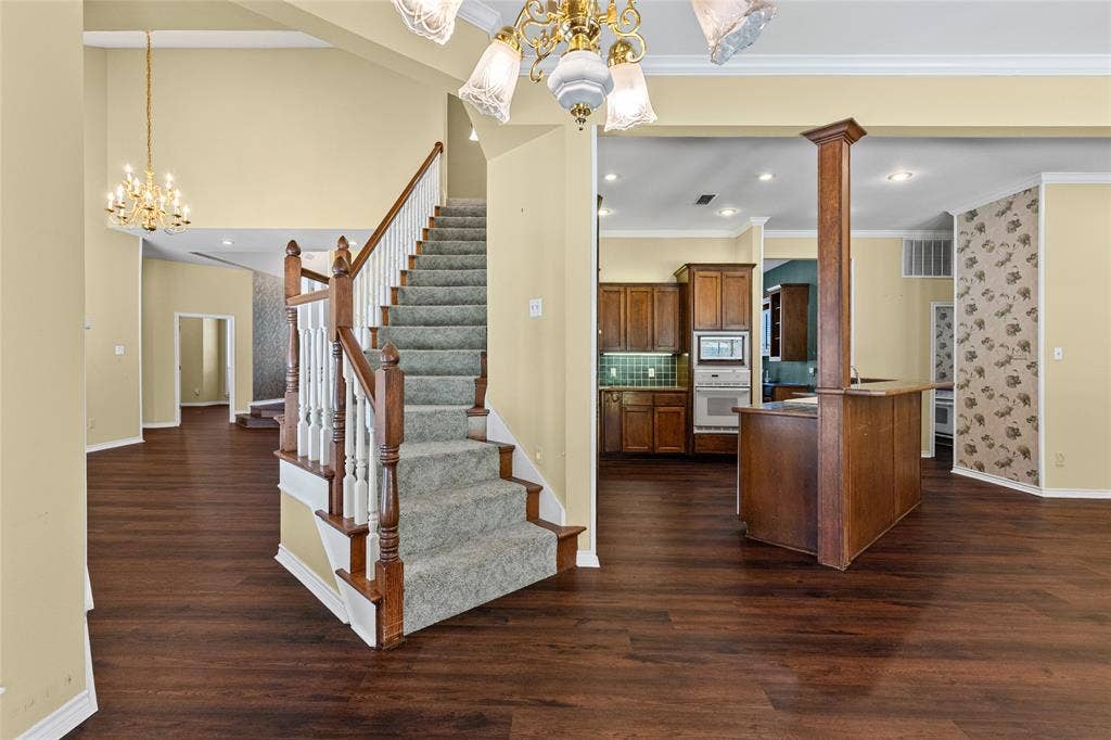 1200 County Road 2307, Sulphur Springs, TX 75482 View of kitchen and stairs to second floor.