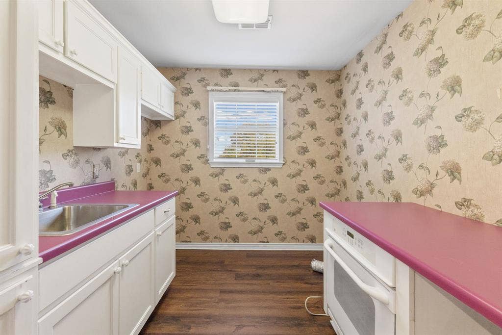 1200 County Road 2307, Sulphur Springs, TX 75482 Utility room is between garage and kitchen, features sink, warming oven for entertaining, space for freezer, washer, dryer.