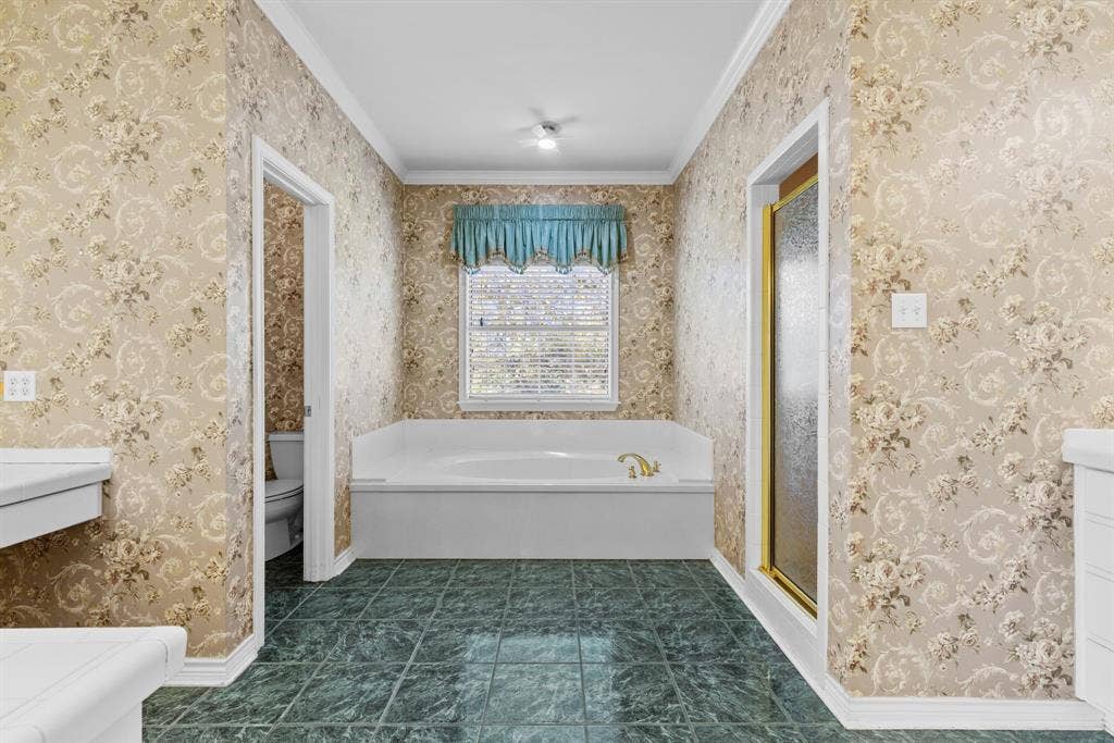 1200 County Road 2307, Sulphur Springs, TX 75482 Primary bathroom has soaking tub and separate shower, private potty and separate vanities.