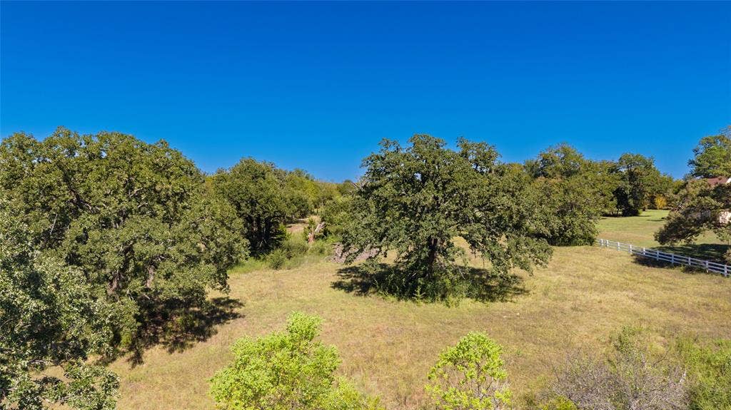 1200 County Road 2307, Sulphur Springs, TX 75482 Hilltop acreage with numerous mature Oak Trees grace this 10 acres on edge of town.