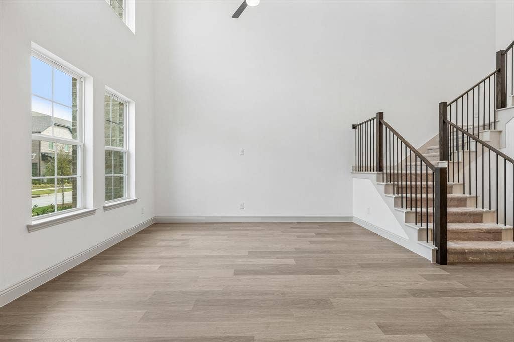1025 Splitrock Drive, Allen, TX 75013 You'll enjoy relaxing in this spacious and bright family room.