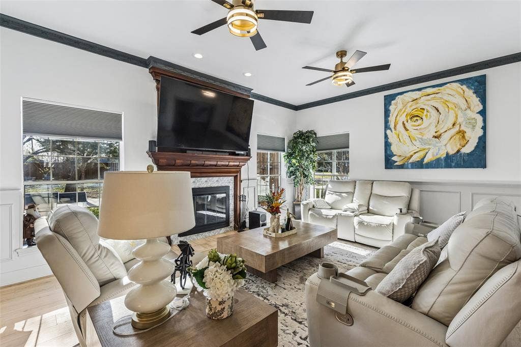 3706 Castle Drive, Rowlett, TX 75089 Wood-finish flooring, recessed lighting, and crown molding