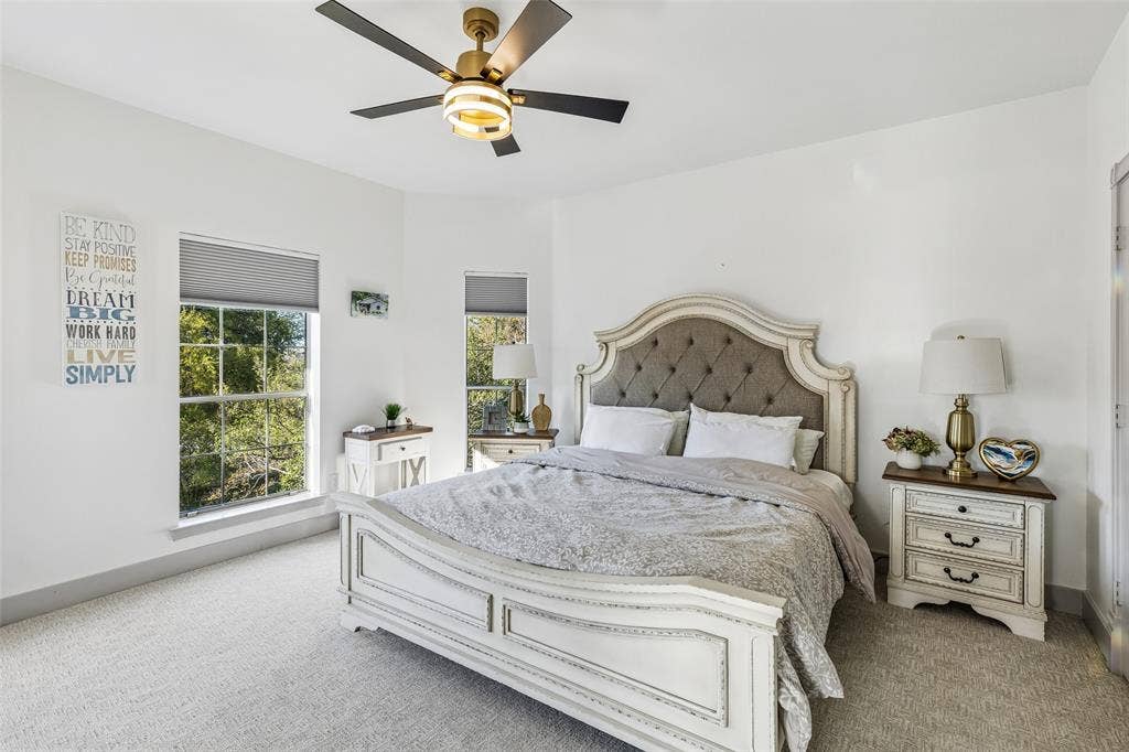 3706 Castle Drive, Rowlett, TX 75089 Plush carpet flooring, multiple windows with blinds, and a ceiling fan with integrated lighting