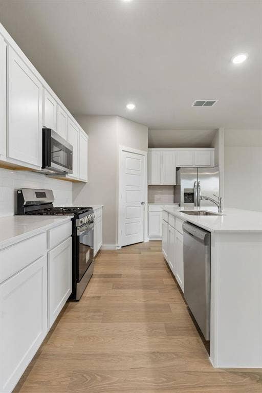 707 Edgehurst Drive, Princeton, TX 75071 Kitchen in the Emmy II home plan by Trophy Signature Homes - REPRESENTATIVE PHOTO