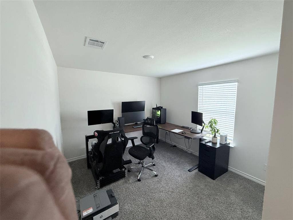 1602 Maple Ridge Drive, Princeton, TX 75407 Carpeted flooring, white painted walls, and a window with blinds
