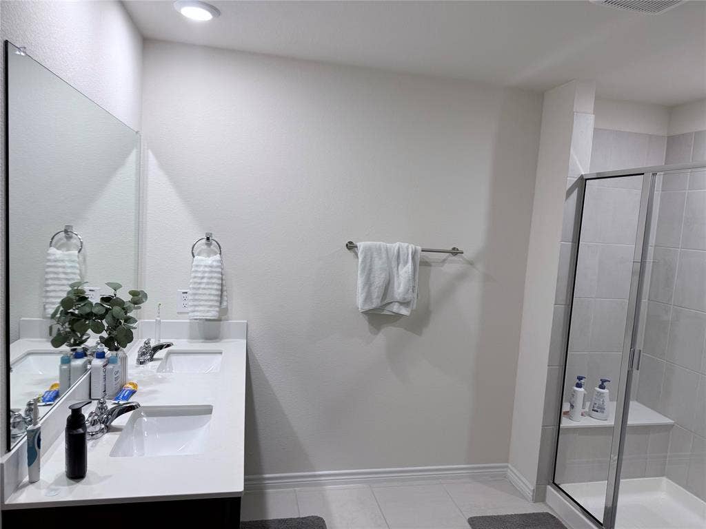 1602 Maple Ridge Drive, Princeton, TX 75407 Dual vanity with integrated sinks and chrome fixtures
