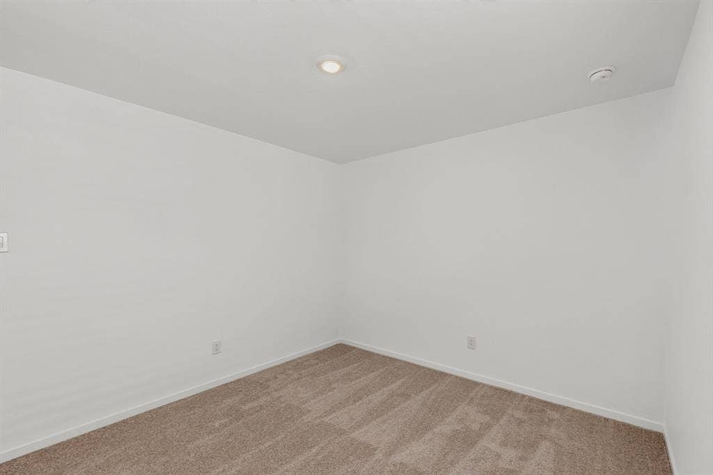624 Kinglet Lane, Princeton, TX 75407 Recessed lighting, light-toned walls, and neutral carpeting