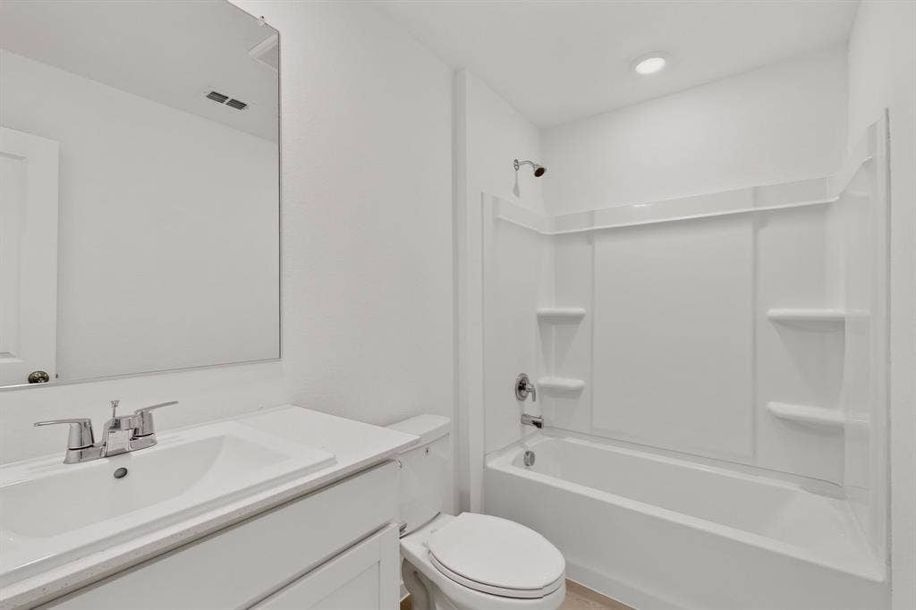 624 Kinglet Lane, Princeton, TX 75407 White vanity with integrated sink and chrome fixtures
