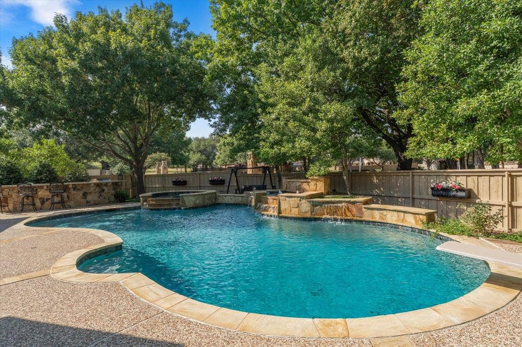 6808 Echo Canyon Drive, McKinney, TX 75072 Too hot? Enjoy this backyard oasis TODAY!