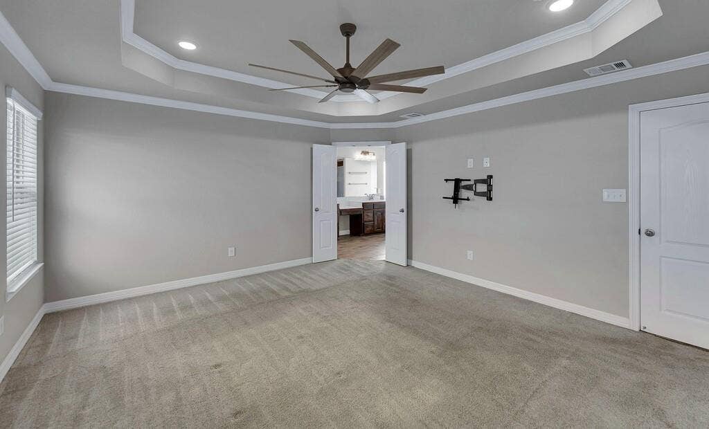 279 Sportsman Drive, Lorena, TX 76655 Tray ceiling with crown molding, recessed lighting, and a ceiling fan