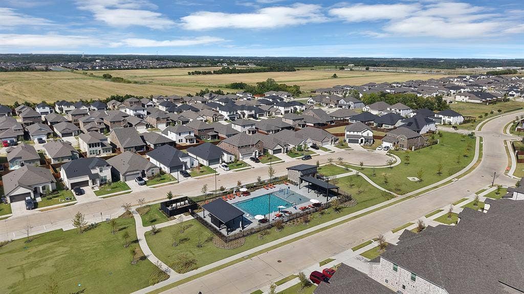 3701 Turpin Drive, Princeton, TX 75071 View of the neighborhood and community pool.