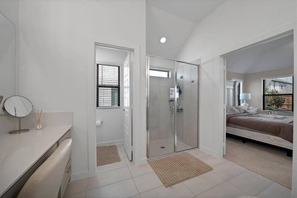 3701 Turpin Drive, Princeton, TX 75071 Vaulted ceilings carry through into the primary bathroom.