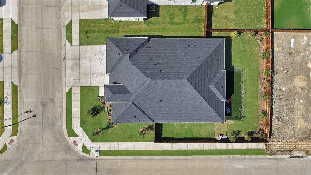 3701 Turpin Drive, Princeton, TX 75071 Aerial view of the property that showcases the well maintained yard. The corner lot is a upgrade.