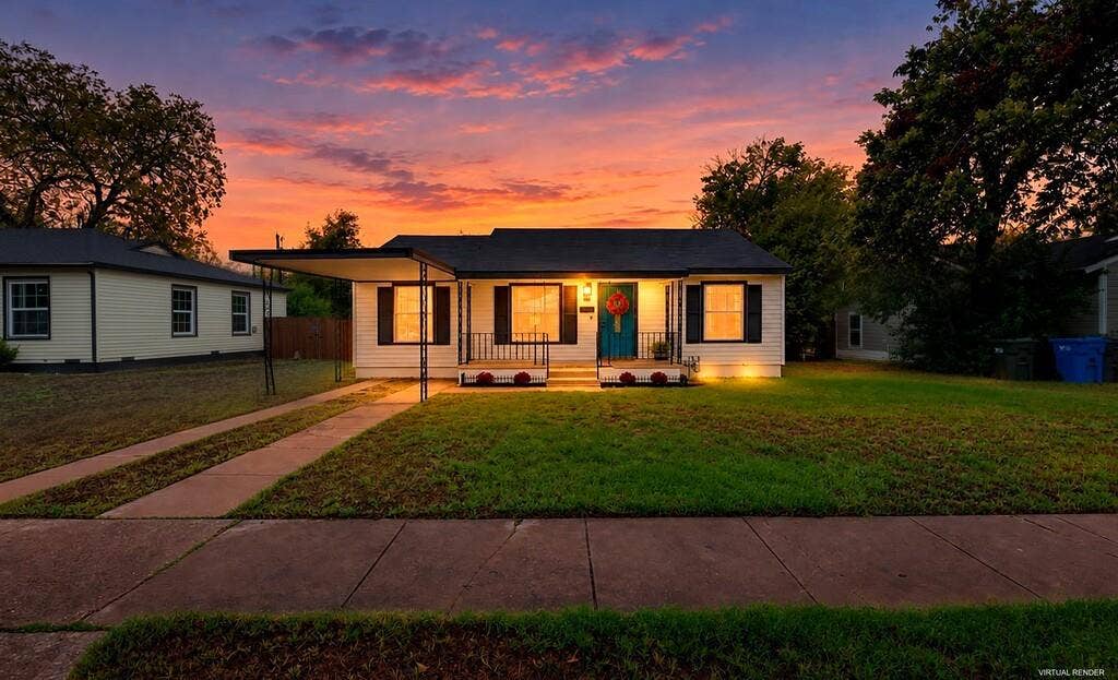3720 Trice Avenue, Waco, TX 76707 White exterior siding with dark shutters, covered front porch with railings, carport, and concrete driveway