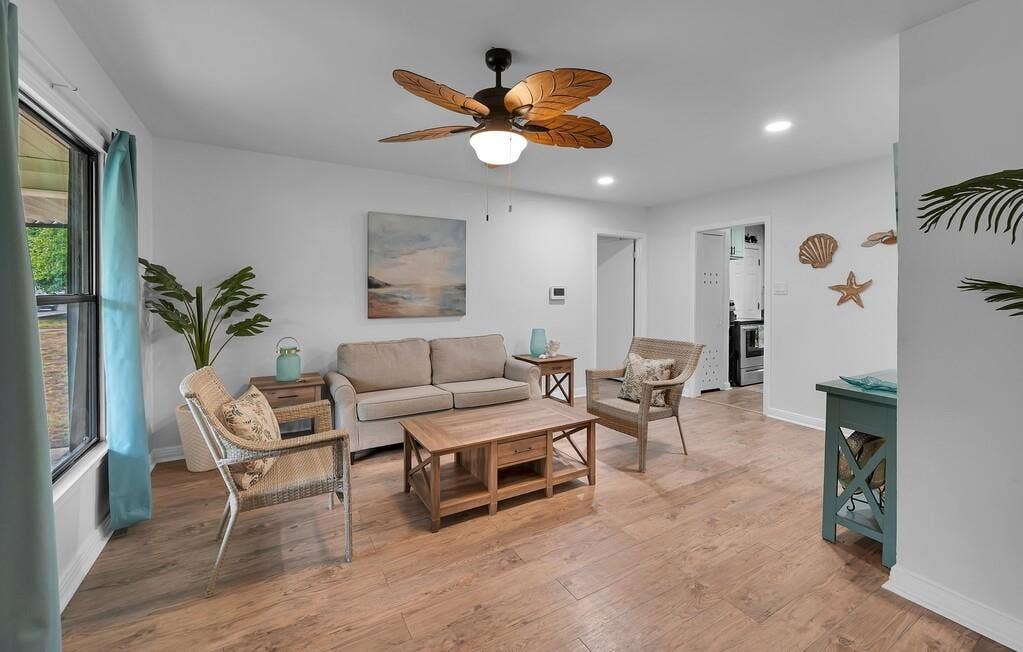 3720 Trice Avenue, Waco, TX 76707 Wood-finish flooring, recessed lighting, and a ceiling fan with leaf-shaped blades