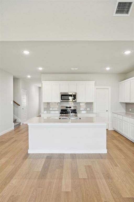 Kitchen in the Masters home plan by Trophy Signature Homes – REPRESENTATIVE PHOTO