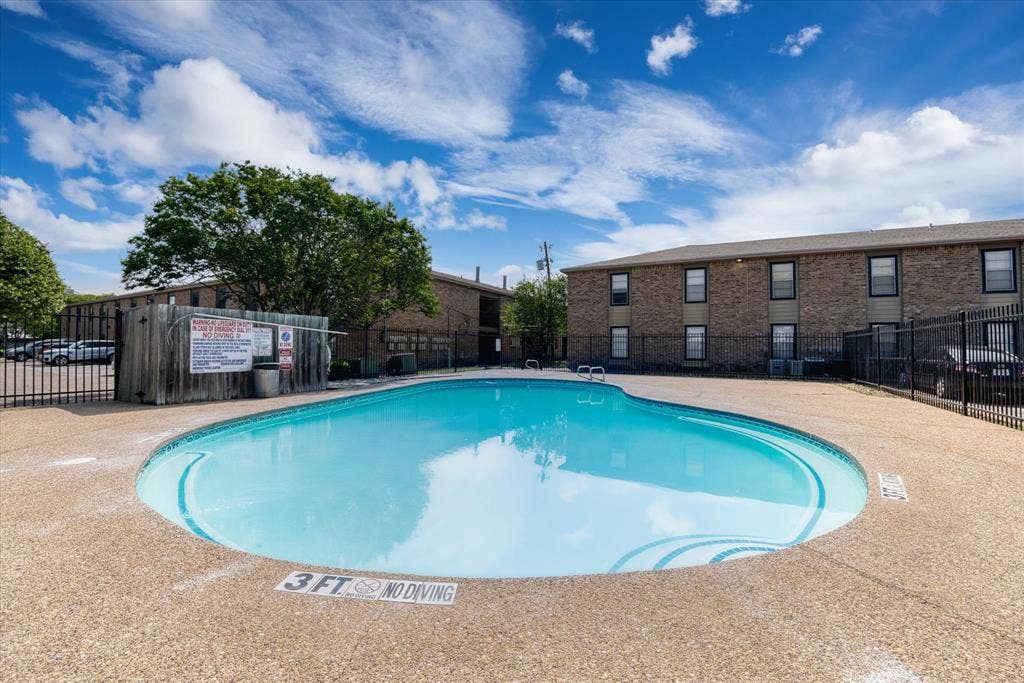 1214 Baylor Avenue, #109, Waco, TX 76706 Swimming pool with a textured concrete deck