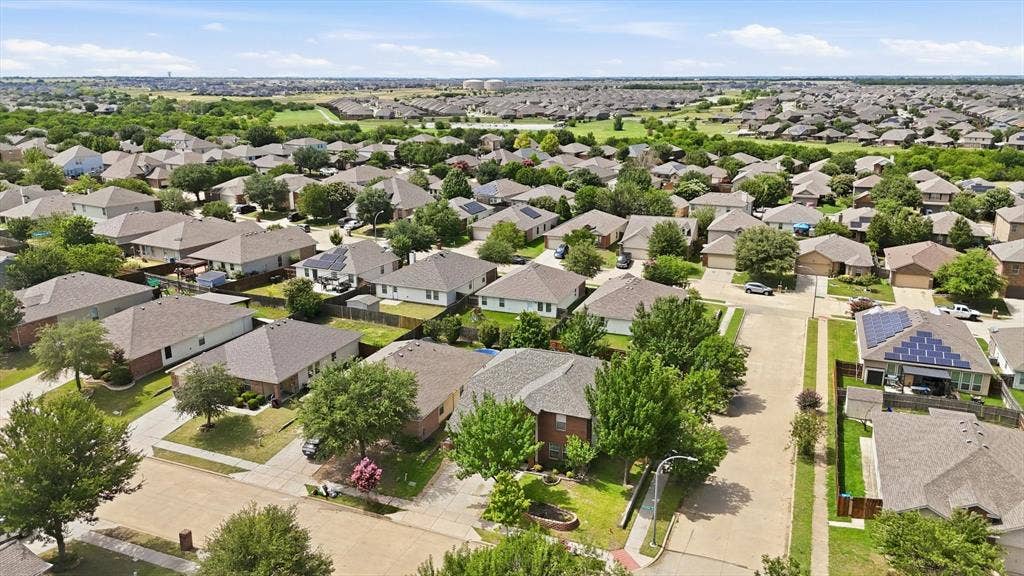 800 Poncho Lane, Fort Worth, TX 76052 Expansive residential area featuring numerous single-family homes, mature trees, and paved streets