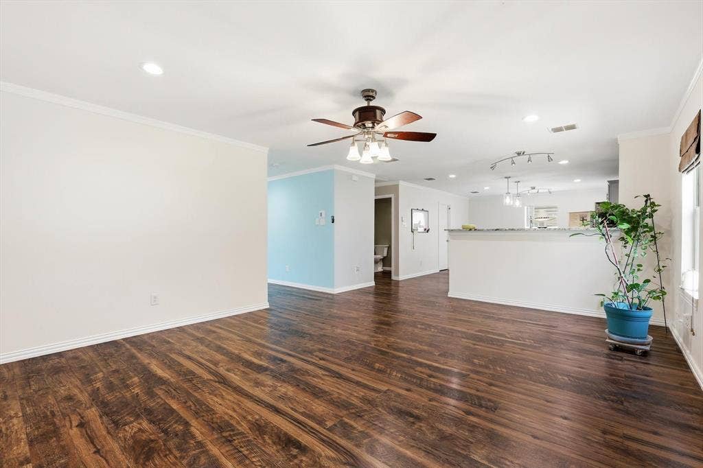 800 Poncho Lane, Fort Worth, TX 76052 Spacious open-concept interior featuring wood-finish flooring, recessed lighting, and a ceiling fan