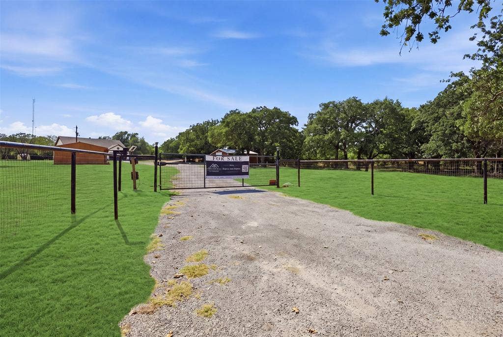 Grass has been digitally enhanced for visual presentation. Entrance