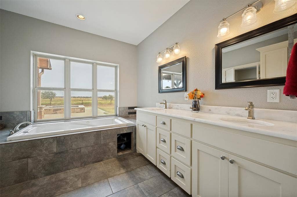 8400 Holder Road, Northlake, TX 76247 Dual vanity with undermount sinks and light-toned countertops