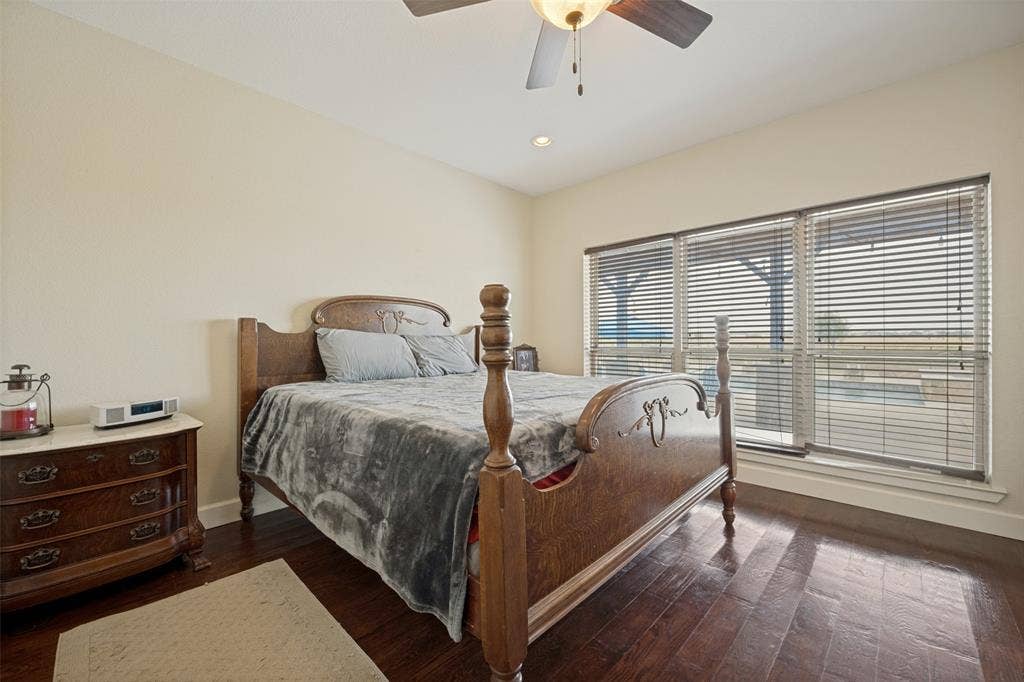 8400 Holder Road, Northlake, TX 76247 Primary bedroom with wood flooring, recessed lighting, and a ceiling fan with light kit