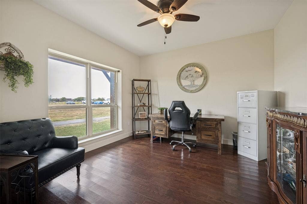 8400 Holder Road, Northlake, TX 76247 Office with wood flooring, vaulted ceiling, large window, ceiling fan with integrated lighting