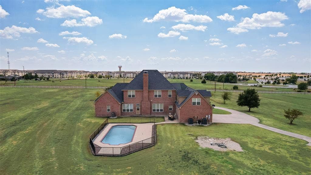 1122 County Road 1224, Celina, TX 75009 Great opportunity for this structure to be used as a Venue or can be torn down for mixed use development.