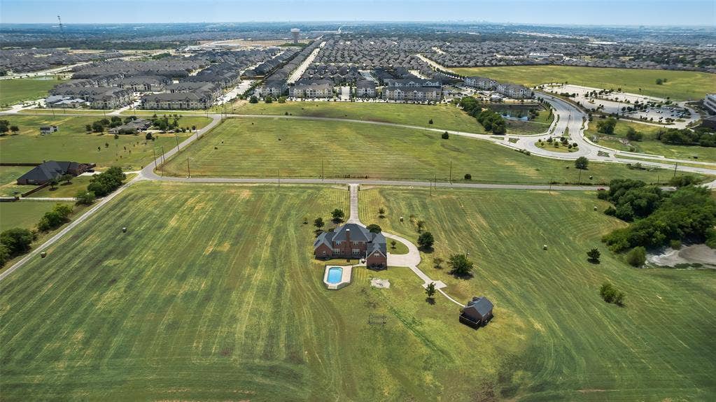 1122 County Road 1224, Celina, TX 75009 Plenty of open space for development. Grass has been digitally enhanced.