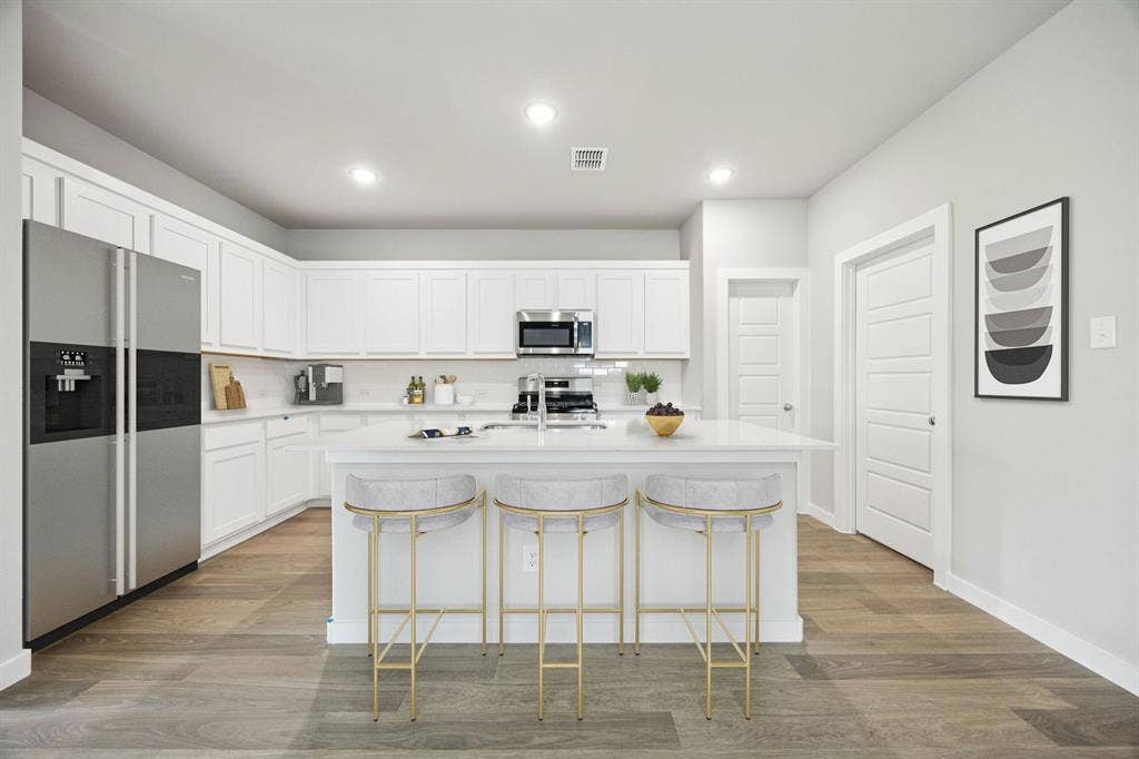 1939 Paddock Lane, Seagoville, TX 75159 Kitchen in the Hayden home plan by Trophy Signature Homes – REPRESENTATIVE PHOTO