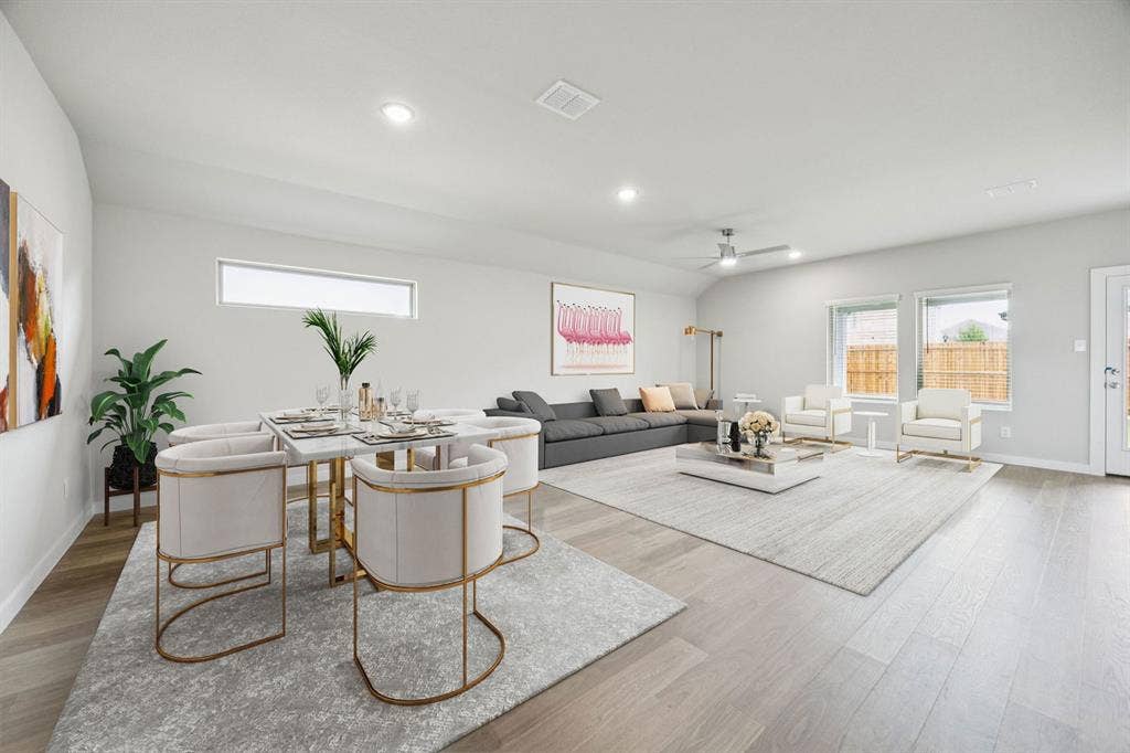 1939 Paddock Lane, Seagoville, TX 75159 Dining and Living Room in the Hayden home plan by Trophy Signature Homes – REPRESENTATIVE PHOTO