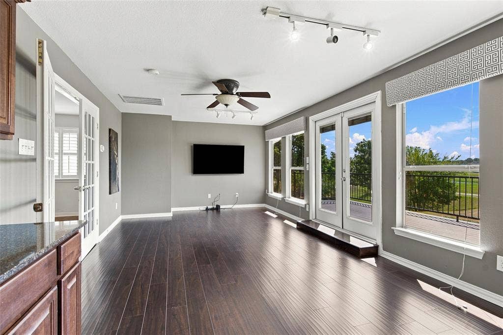 1820 Forest Bend Lane, Keller, TX 76248 Spacious gameroom featuring views of the golf course and balcony access with a wet bar.