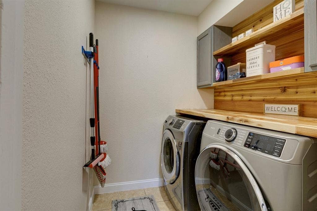 1408 Quapaw Trail, Mesquite, TX 75149 Built-in wood-finish shelving with a matching countertop