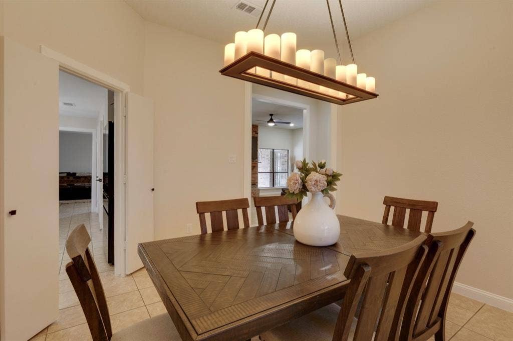 1408 Quapaw Trail, Mesquite, TX 75149 Rectangular wood-finish chandelier with multiple lights