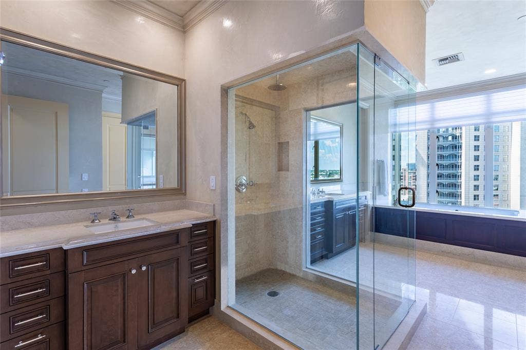 2525 N Pearl Street, #1001, Dallas, TX 75201 Primary Bath has dual vanities and dual water closets.