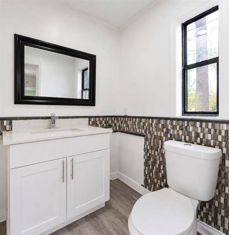 6048 Hidden Circle, Azle, TX 76020 White vanity with an integrated sink, polished chrome faucet, and quartz countertop